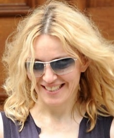 Madonna w Oliver Peoples Farrell.jpg